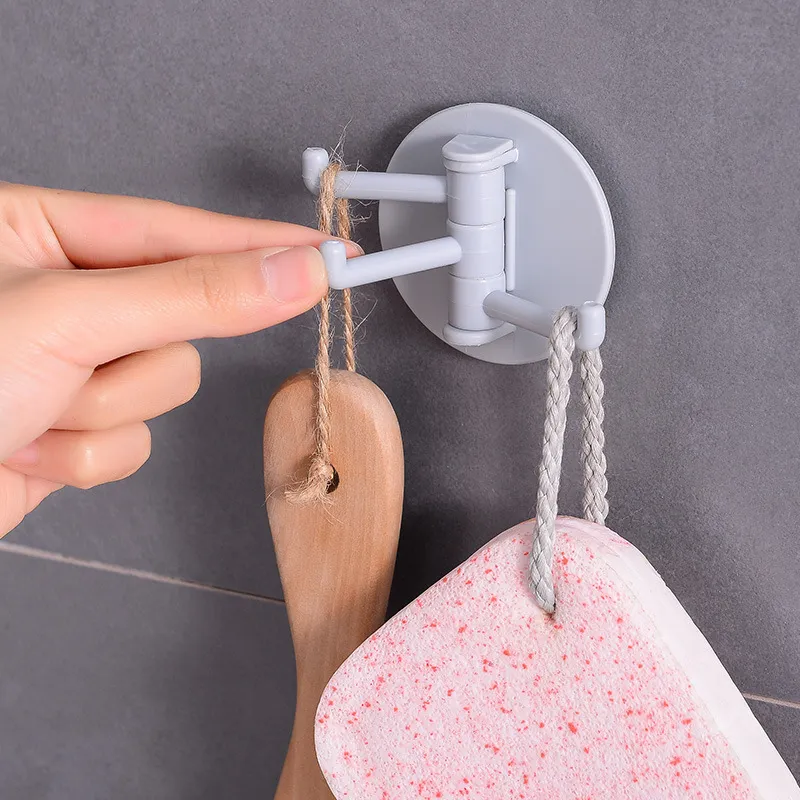 Multifunctional bathroom wall shelf free punching seamless trace rack rotating hook strong 3 branch rotating sticky hook 6