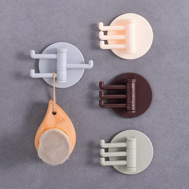 Multifunctional bathroom wall shelf free punching seamless trace rack rotating hook strong 3 branch rotating sticky hook 2