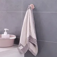 Multifunctional bathroom wall shelf free punching seamless trace rack rotating hook strong 3 branch rotating sticky hook 3