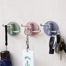Multifunctional bathroom wall shelf free punching seamless trace rack rotating hook strong 3 branch rotating sticky hook 4